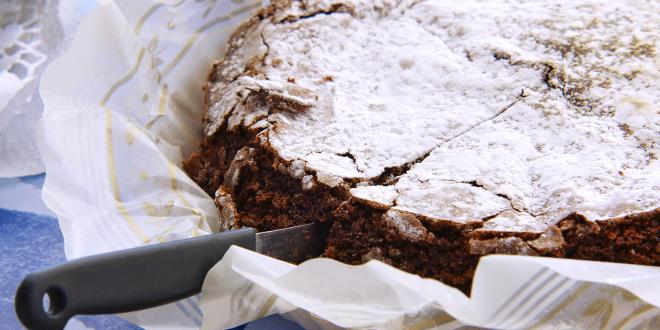 a gluten-free chocolate cake on parchment paper