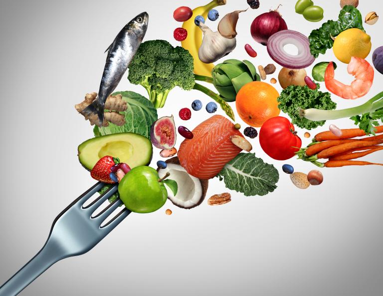 Illustration of a fork with many healthy foods bursting from it.